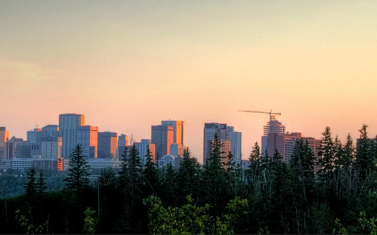Downtown Edmonton skyline at golden hour above the river valley