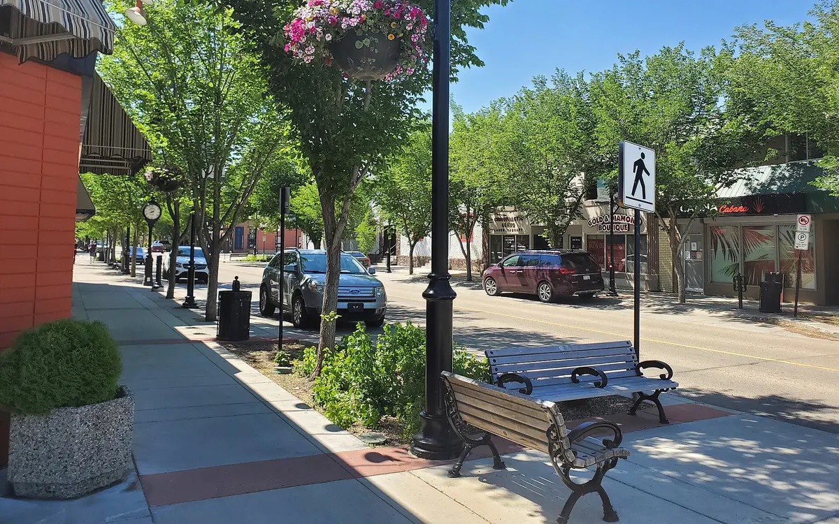 Tree-lined main street in downtown Fort Saskatchewan in summer