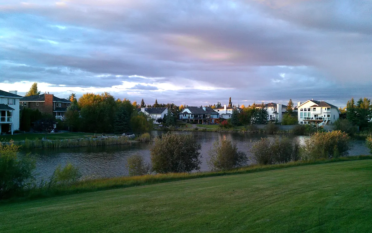 Lakefront executive homes in Sherwood Park at dusk